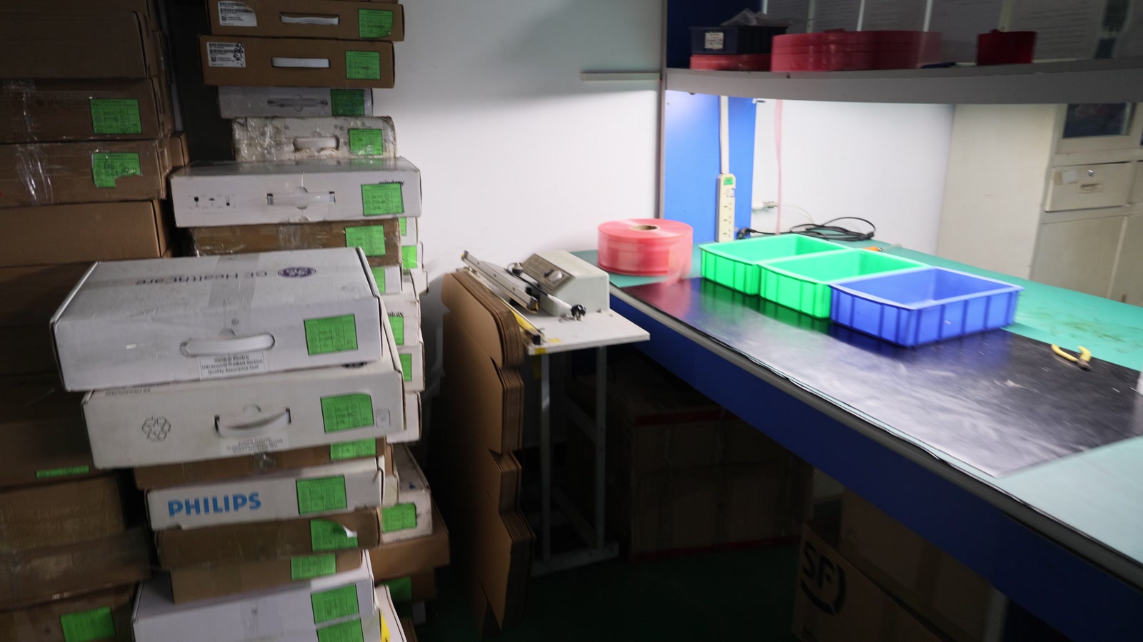 Learning Centre 8 Packing area with original GE Healthcare and Philips probe cases ready for return shipping