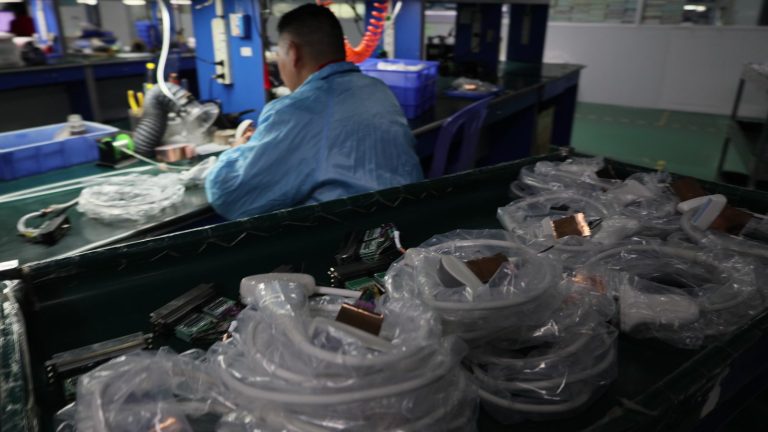Ultrasound probes and control boards on the workshop line