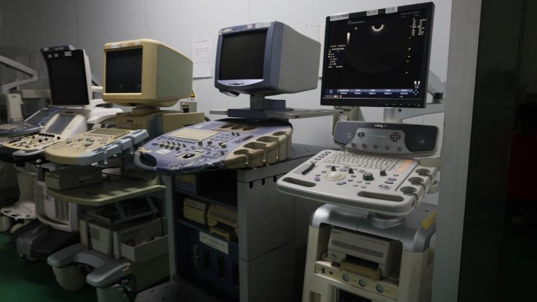 Ultrasound systems in our test bay, including a GE LOGIQ P5 running a live image