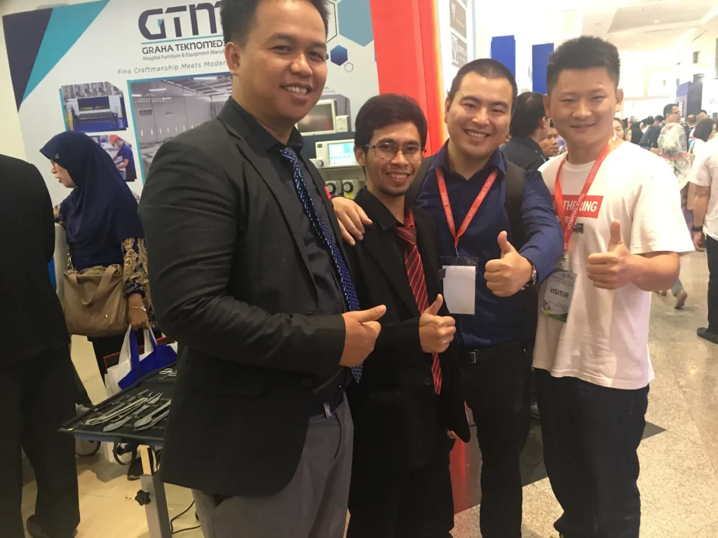 Akicare at a medical imaging exhibition with customers and distributor partners