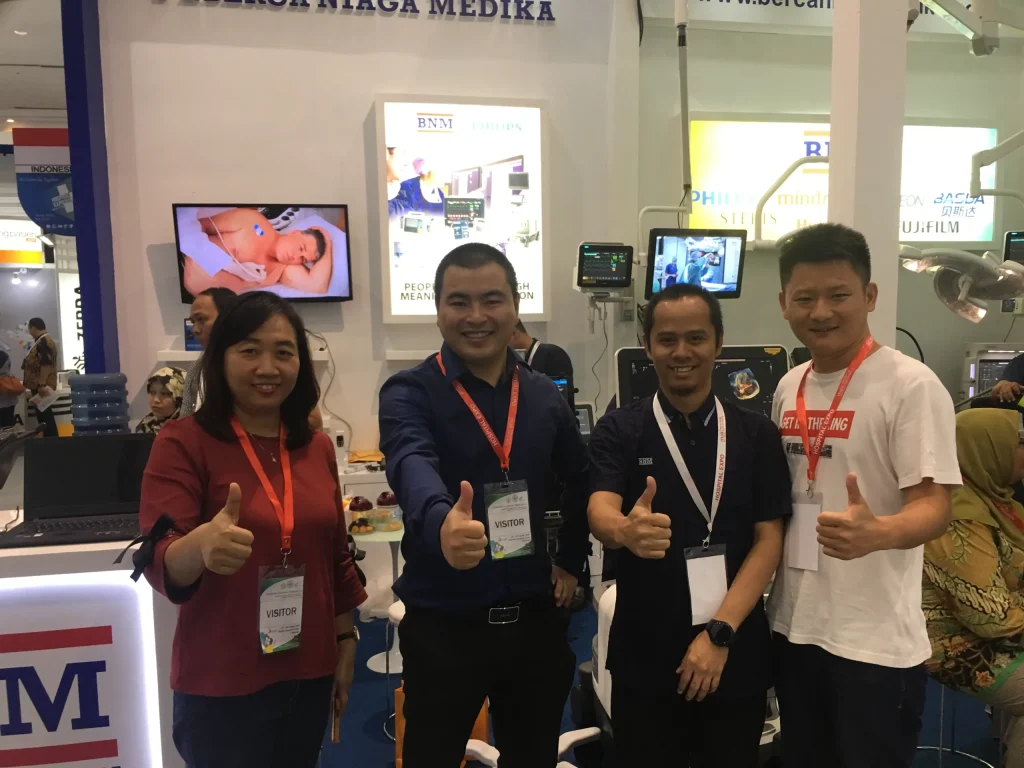 Akicare at a medical imaging exhibition with customers and distributor partners