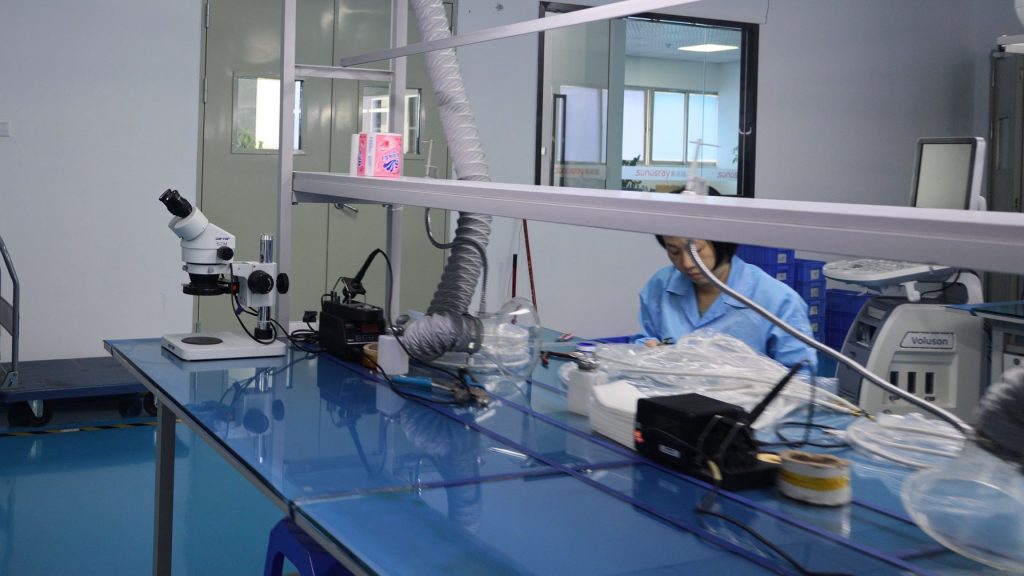 What Microscope inspection station on the ultrasound probe repair floor