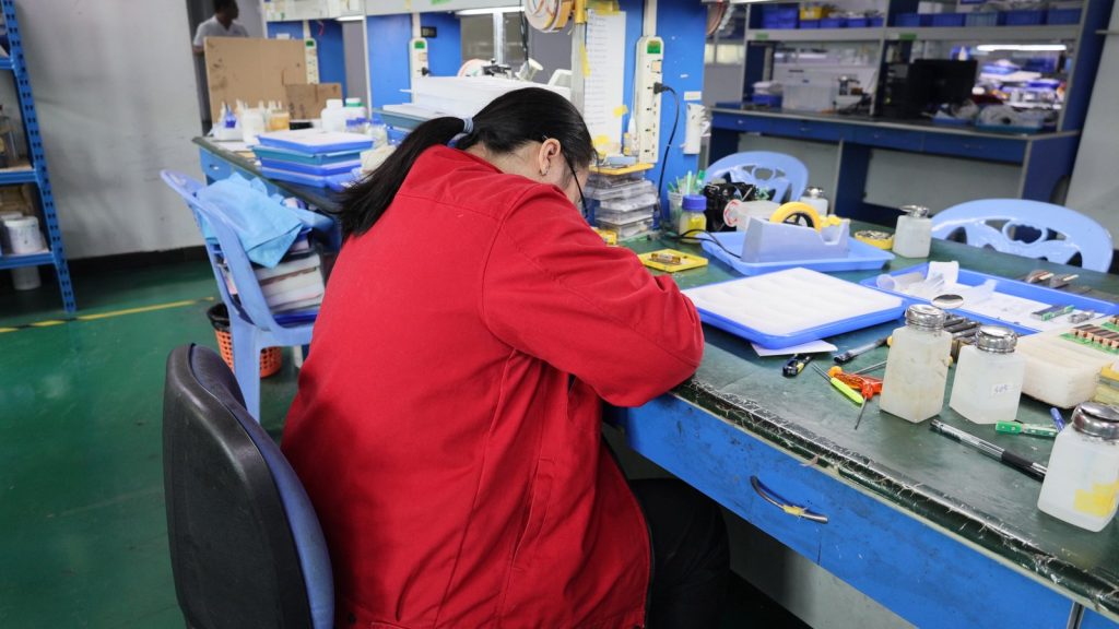 Ultrasound probe opened for inspection on a repair bench